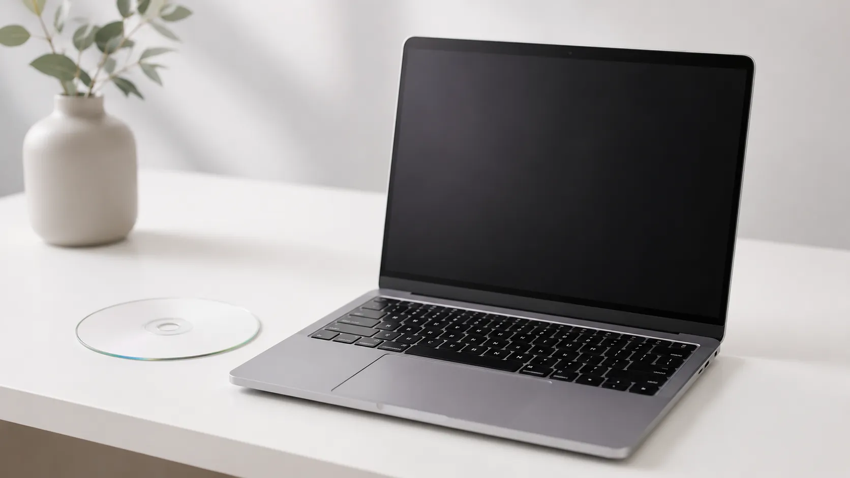 MacBook Pro with blank DVD disc ready for subtitle burning on Mac